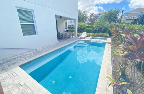 West Kissimmee Villa | NEW! Elegant 8BR Retreat w/Private Pool, Spa & Family-Friendly Comfort