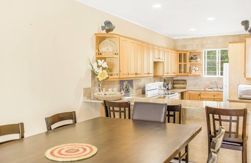 Gambier House | NEW Gated Beach front Condo