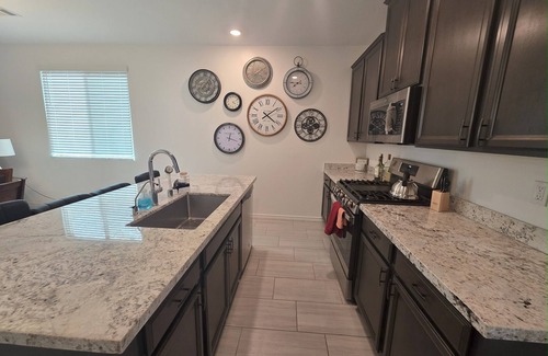 North Las Vegas House | New Gated Luxury: Modern gated 2 bed 2 bath home with soaking Tub, Patio, BBQ.