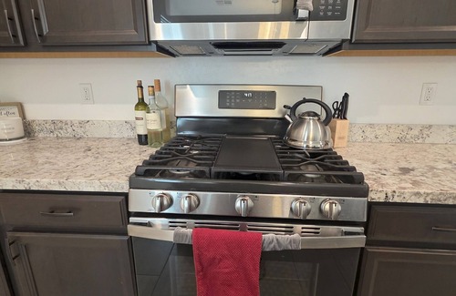 North Las Vegas House | New Gated Luxury: Modern gated 2 bed 2 bath home with soaking Tub, Patio, BBQ.