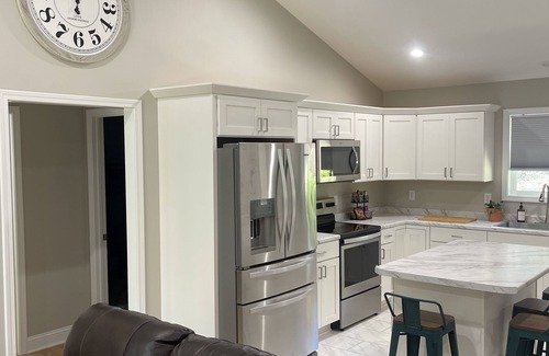 Hendersonville House | NEW house nestled in a quiet area. Has hot tub & game room. 5 min to down town.