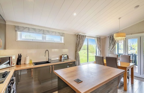 Woodhall Spa Ski Chalet | New in 2018. Modern and luxurious lodge with lakeside view.