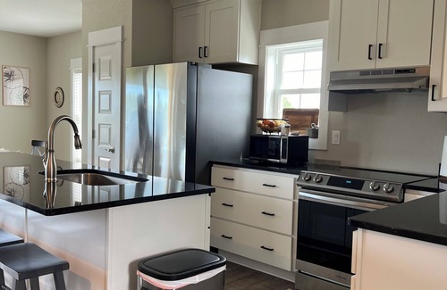 Carova Beach House | New in 2024 Carova Beach Canal Front Home! 4x4 Required