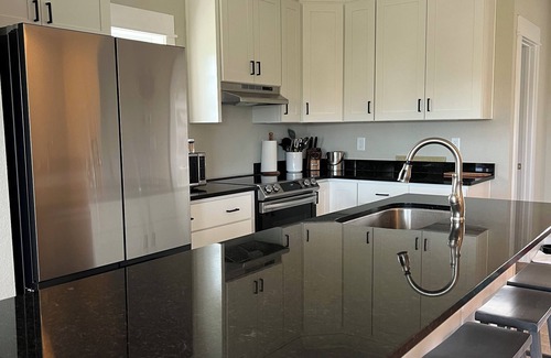 Carova Beach House | New in 2024 Carova Beach Canal Front Home! 4x4 Required