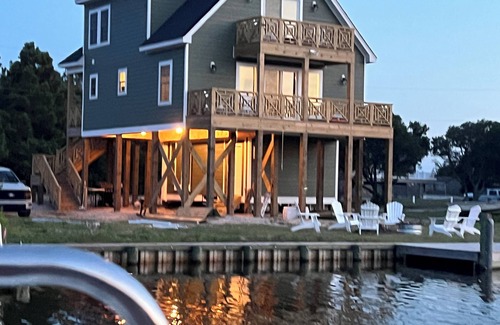 Carova Beach House | New in 2024 Carova Beach Canal Front Home! 4x4 Required
