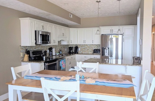 Geneva-on-the-Lake Condo | New-Lakefront Condo Lake Erie Vista 107-3BR/2BA Private beach/balcony-SPIRE