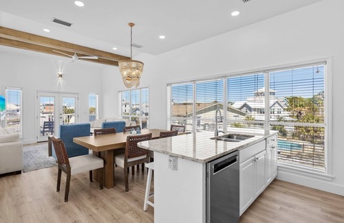 Dune Allen Beach Apartment | New Listing! Gulf and Lake Views! Private Dock! Beach Access Just Across the Street! Bikes!