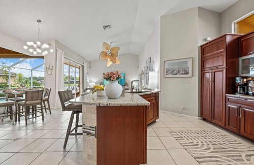 Central Naples House | NEW Luxury 4-Bedroom/3 bath Lakefront Naples Villa! Heated Salt-Water Pool!
