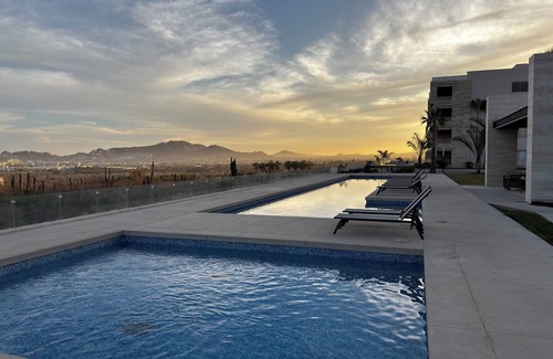 Cabo San Lucas Condo | NEW Luxury Condo in Cabo w/pool access & firetable. 5 minutes from downtown