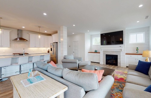 North Carolina Coast House | New Modern House w/Large Deck, Water View, Elevator, Dog Friendly + Big Fenced Yard