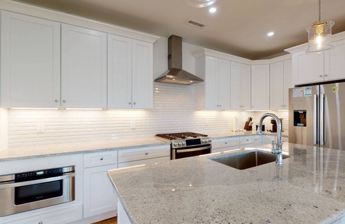 North Carolina Coast House | New Modern House w/Large Deck, Water View, Elevator, Dog Friendly + Big Fenced Yard