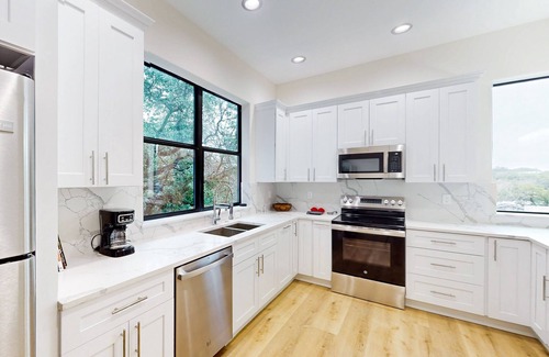 Wetmore Condo | New modern town home with full kitchen, living room & top floor balcony