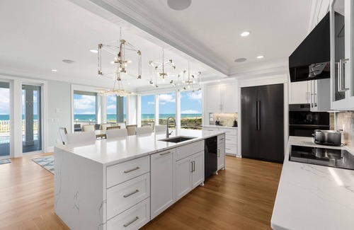 Kure Beach House | NEW! Ocean Front luxurious 6 bedroom home Pool, Elevator, and on the Beach!