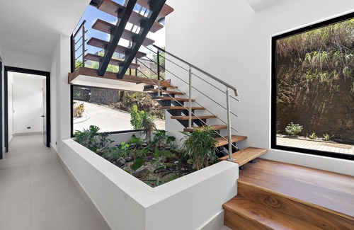 Coco House | NEW Oceanview Home - Two Terraces - Five Primary Suites - Smart TVs + Foosball - Gated Entry