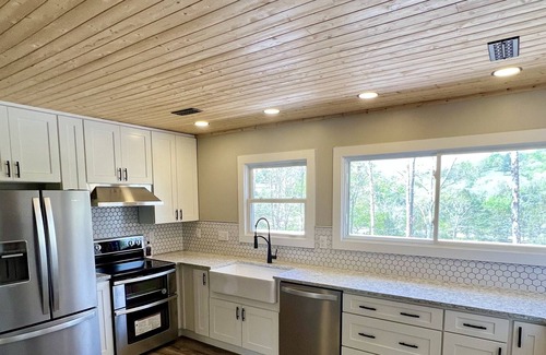 Rock Harbor House | New Remodeled Lakefront Home - Large Dock with Year Around Water!