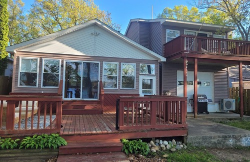 National City House | New! Seven Oaks at Bass Lake - Beautiful Lakefront Getaway with Dock and Canoe!