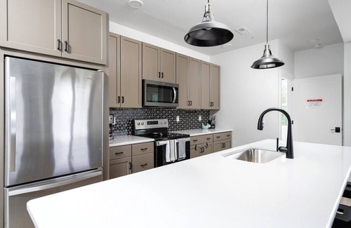 Traverse City Condo | NEW Slabtown Suites 201
