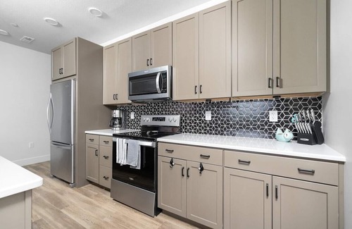 Traverse City Condo | NEW Slabtown Suites 201