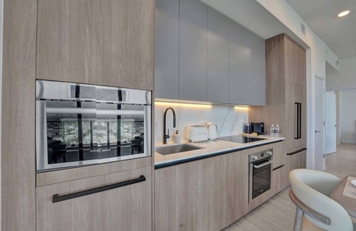 North Beach Condo | NEW: Sophisticated 4BR Condo with Breathtaking Ocean Views