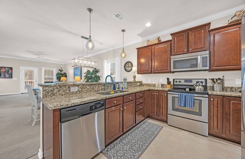North Myrtle Beach Condo | New Spacious 3BR Barefoot Resort Condo: Enclosed Balcony, Beach, Dining & Golf