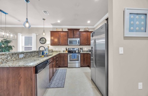 North Myrtle Beach Condo | New Spacious 3BR Barefoot Resort Condo: Enclosed Balcony, Beach, Dining & Golf