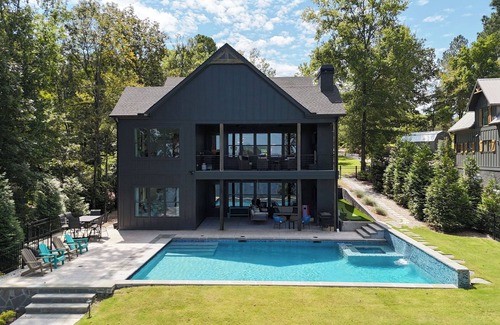 Buckhead House | NEW Stunning Lakefront Heated Pool Spa Game Room Putting Green Dock