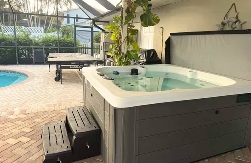 Palma Sola House | NEW! Sunshine Getaway! Heated Pool, Hot Tub, Games