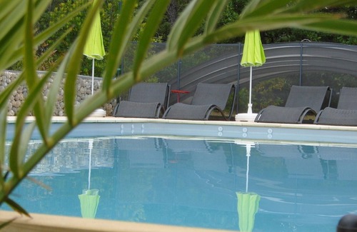 Saint-Julien-de-Peyrolas Villa | New villa-8 to12 persons-isolated-6 bedrooms-sauna and swimming pool with opt heating