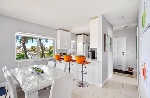 Pompano Beach Condo | NEW! Waterfront Retreat with Views & Pool Access