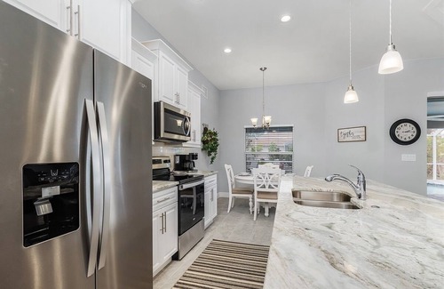 Burnt Store House | Newly built. Heated pool. Ideal for poolside relaxing and romantic gateways