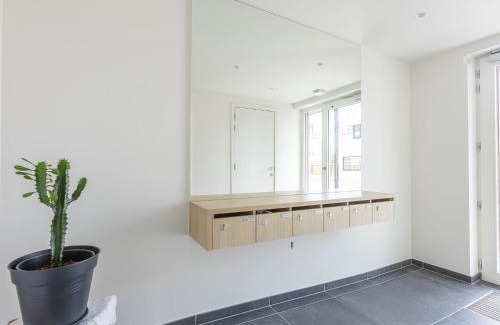 Middelkerke Apartment | Newly built rooftop flat with sun-facing terrace