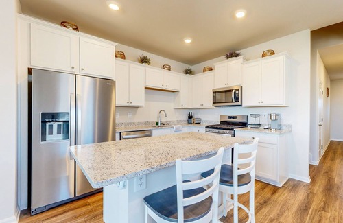 Millville House | Newly remodeled - dog friendly townhome with pools, tennis, washer/dryer & AC