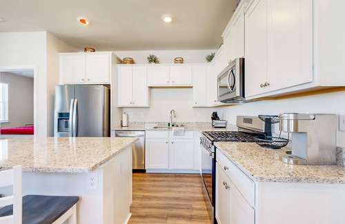 Millville House | Newly remodeled - dog friendly townhome with pools, tennis, washer/dryer & AC