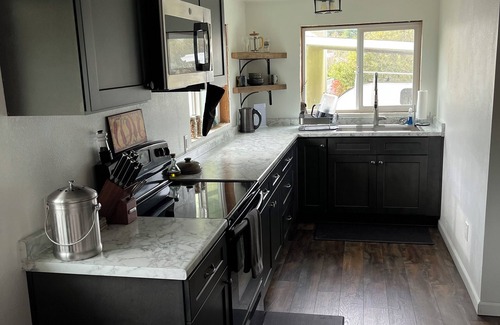 Crescent City House | Newly remodeled Farm House with sauna and hot tub!