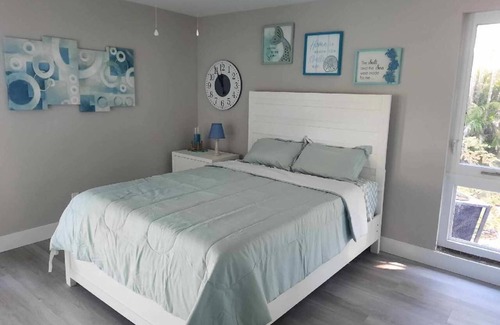 The Dunes House | Newly renovated 2024. Located on golf course with a lake view and pool.