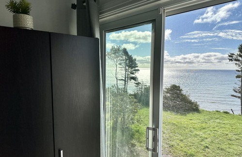 Pabos House | Newly Renovated Beach Home Steps Away from the Sea with 3 Bedrooms, queen beds.