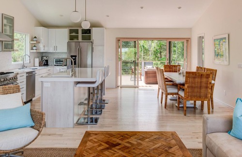 Clearwater Beach House | Newly renovated contemporary with glimpse of Gardiners Bay, custom details.