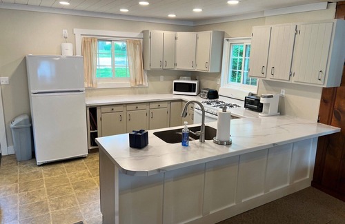 Angola Cottage | Newly renovated kitchen 2024. Dead end Street, Large Yard, not on a hilltop.