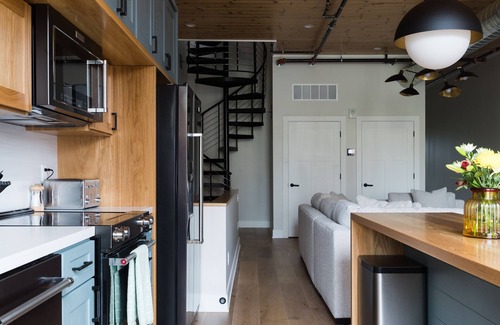 Traverse City Condo | Newly Renovated Luxury Loft with Rooftop Patio in the Heart of Downtown TC