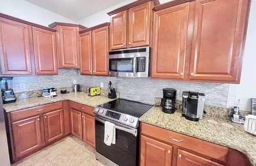 Davenport House | Newly Renovated Luxurious 8BR Oasis- Pool, Spa, Home Theater, Steps from Disney