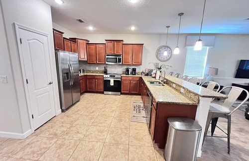 Davenport House | Newly Renovated Luxurious 8BR Oasis- Pool, Spa, Home Theater, Steps from Disney