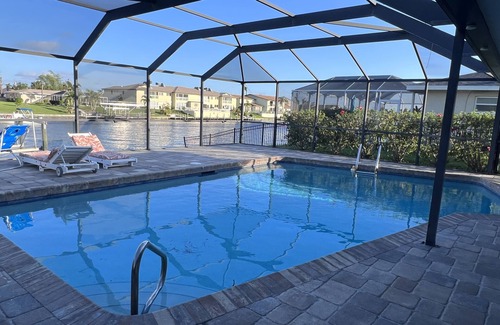 Caloosahatchee House | Newly Renovated Modern 2 Bedroom 2 Bath Waterfront with Heated Pool