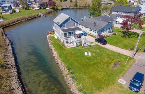Branford House | Newly Renovated Summer Island Pt Home Surrounded By Water With Spectacular Views