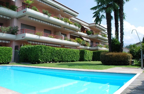 Caslano Apartment | Nice apartment for 4 guests with WIFI, pool, TV, patio and pets allowed