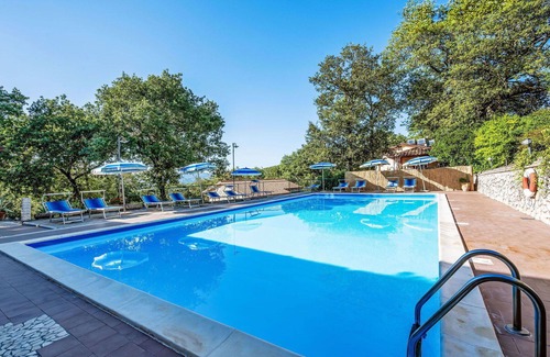 San Feliciano Apartment | Nice apartment for 4 guests with pool, A/C, WIFI, TV, patio and pets allowed