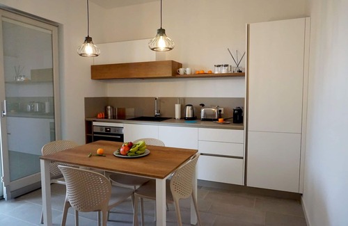 Laureto Villa | Nice apartment in villa for 4 guests with hot tub, WIFI, A/C, TV and veranda, close to Alberobello