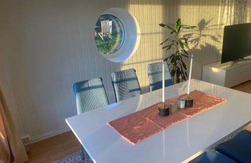 Oslo Apartment | Nice Family Friendly apartment 2 bed Rooms with sea view located in Nordstrand for 5 guests with a garden and grill with sea view just beside the apartment