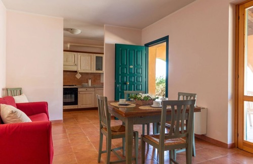 Pian dei Mucini Apartment | Nice three-room apartment in typically Tuscan style on the ground or first floor of approximately 50 m2 located in the area around the swimming pools.It is composed of a living room with dining area, flat-screen television and sofa bed, kitchenette equip
