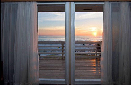 New Smyrna Beach Apartment | NO PET FEES - Angel Inn the Sand - Fish Unit Upstairs North Direct Beach Front