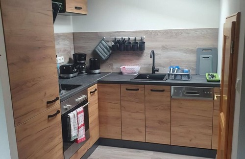 Oberschonau Apartment | Non-smoking vacation apartment, 65 m², separate bedroom, living room with open kitchen, 2 WCs, balcony